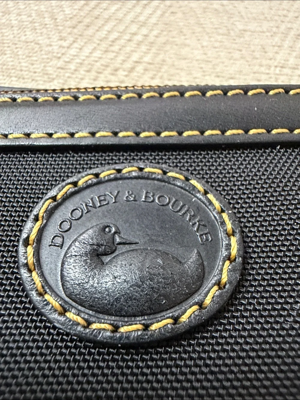 Dooney & Bourke Black Shoulder Wristlet with Contrast Stitching